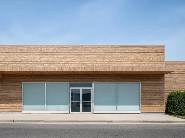 Retail façade with woodgrain metal siding