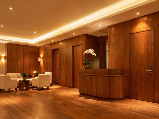 Boutique hotel lobby with woodgrain wall paneling